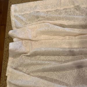 Pottery Barn cream sheer panel window coverings